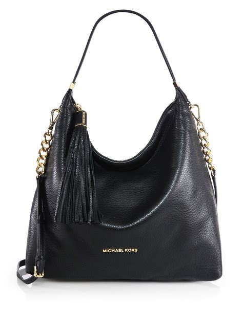 Michael Kors black handbags